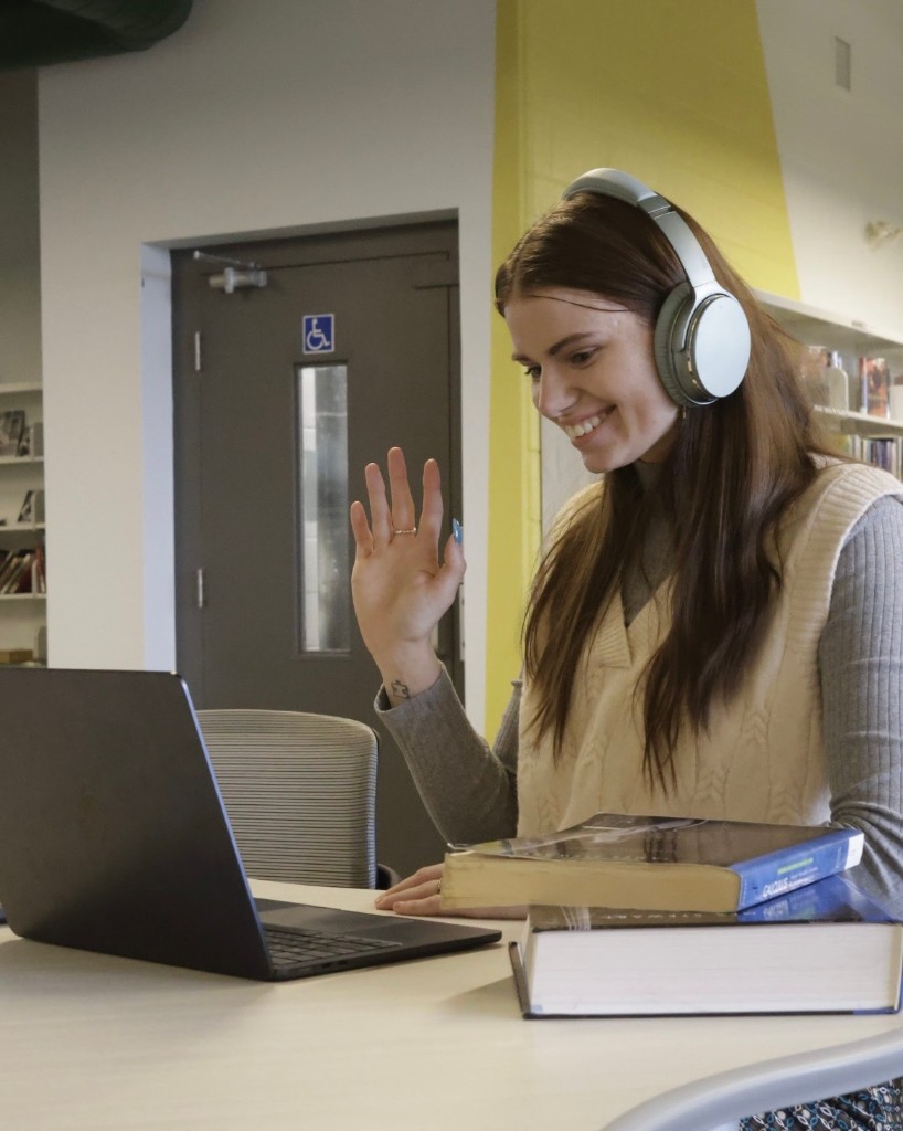 Olivia Matthews tutoring online from her desk